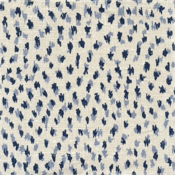 Fabric in a cheetah print in blue and navy on a cream field.