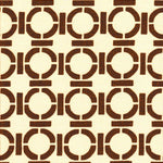 Detail of fabric in a round geometric grid print in brown on a cream field.