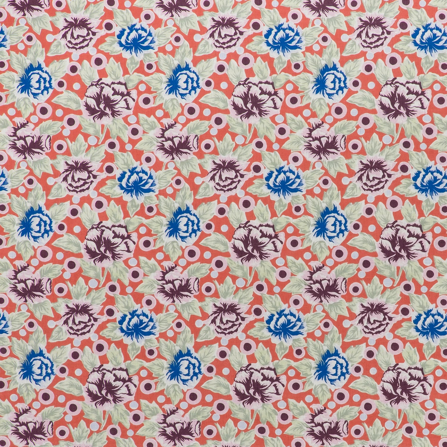 Printed linen fabric in a repeating china rose pattern in shades of pink, blue and cream on a coral field.