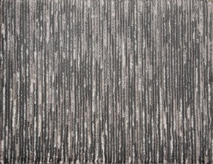 Broadloom carpet swatch in lined pattern dark grey color