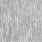 Broadloom carpet swatch in lined pattern light grey color