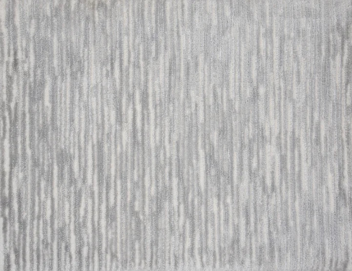 Broadloom carpet swatch in lined pattern light grey color