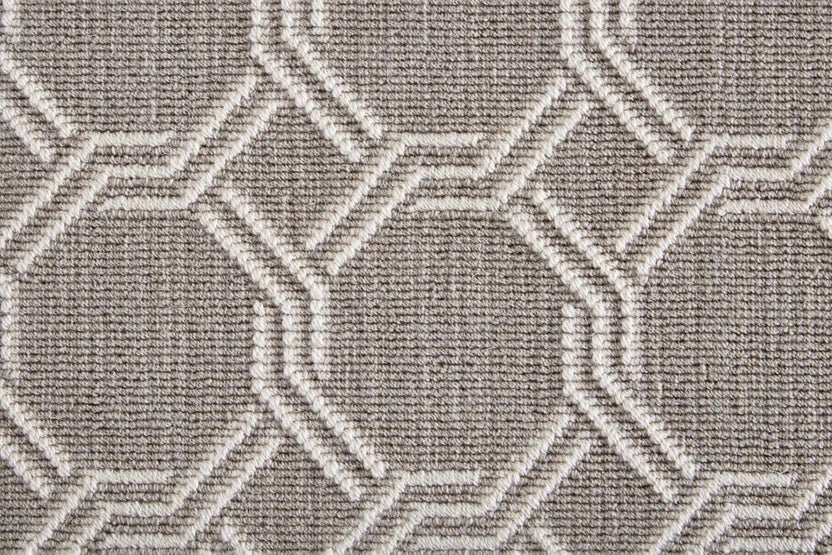 Broadloom carpet swatch in geometric pattern medium grey color