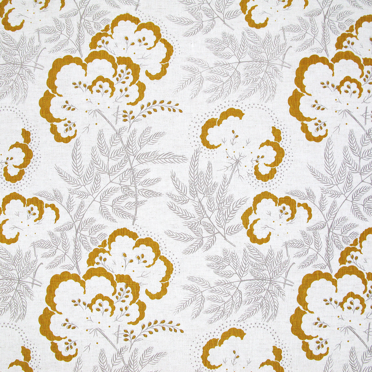 Detail of fabric in an intricate floral print in mustard and gray on a white field.
