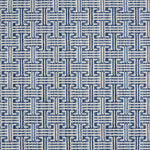 Patterned carpet with a geometric design in blue and white