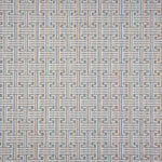 Patterned carpet with a geometric design in blue, grey tan, green and white