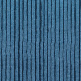 Fabric in a painterly stripe pattern in navy on a blue field.