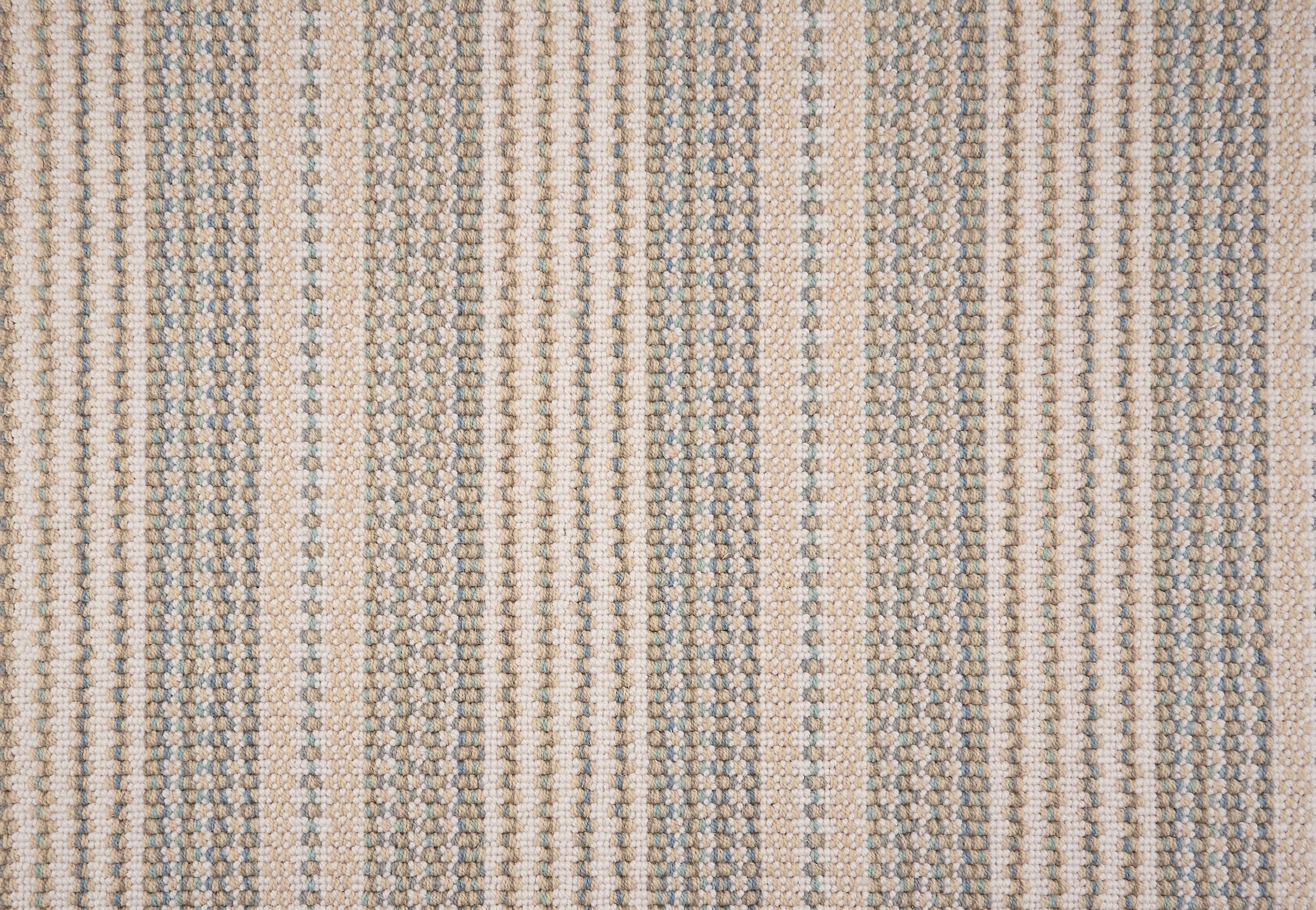 Broadloom carpet with beige and seafoam green stripes.