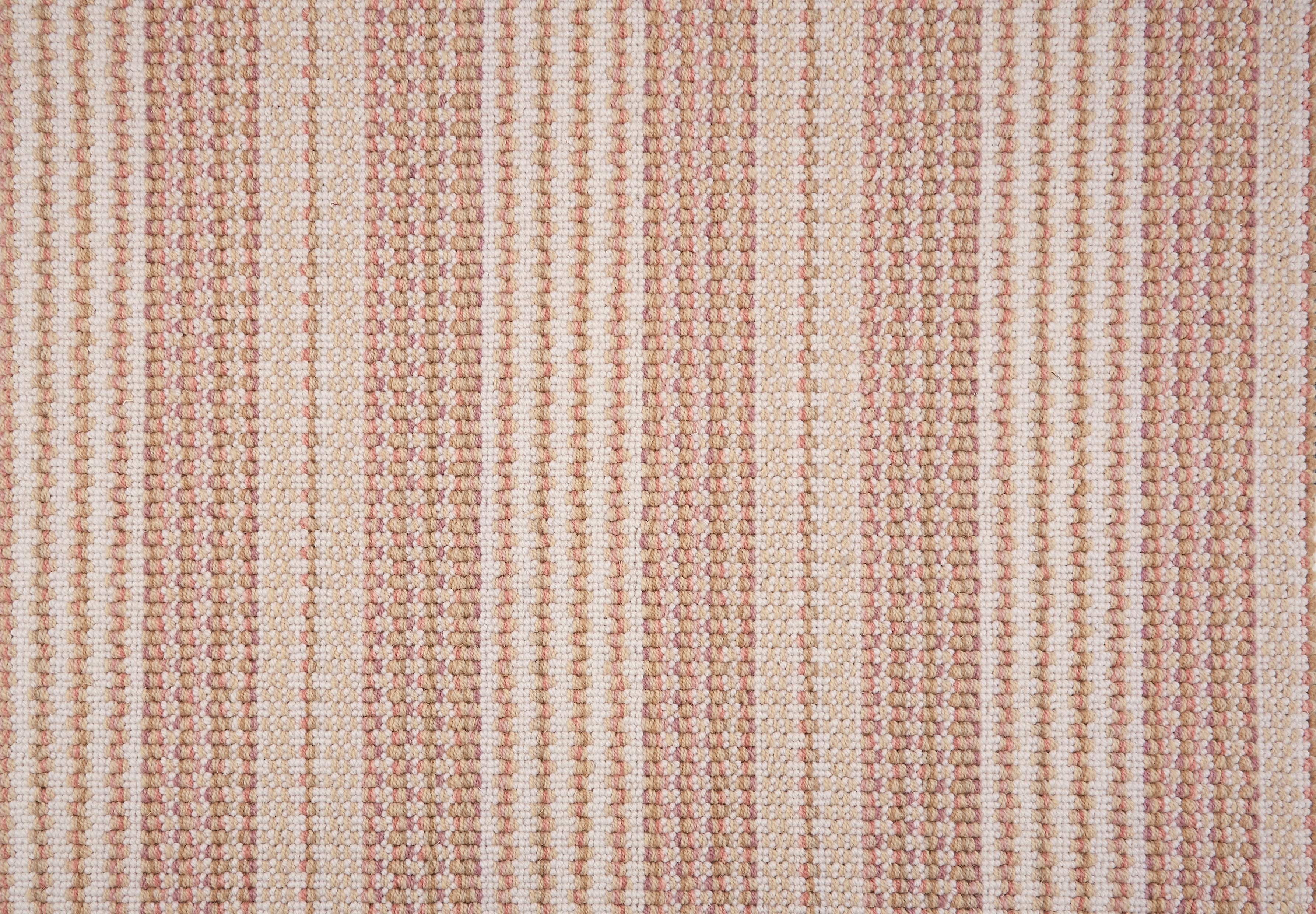 Broadloom carpet with pastel pink and beige stripes