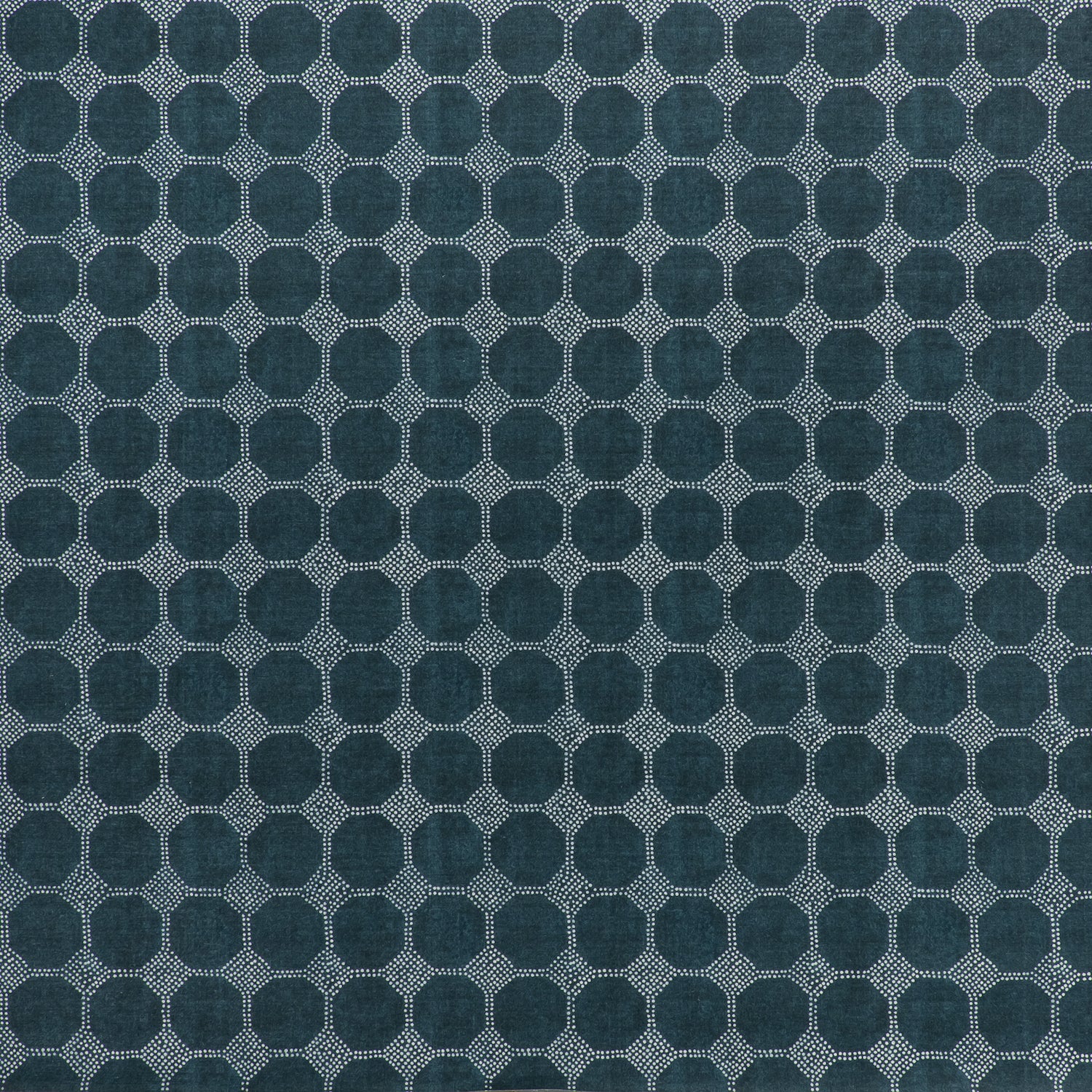 Printed linen fabric in a repeating gridded dot pattern in white on a navy field.