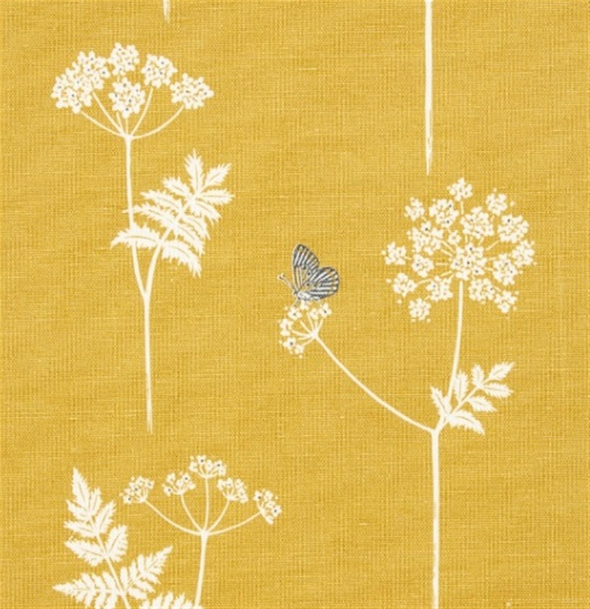 Detail of fabric in a playful flower and butterfly print in white and charcoal on a mustard field.