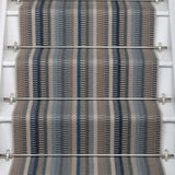 Striped flatweave runner in blue and grey on white staircase