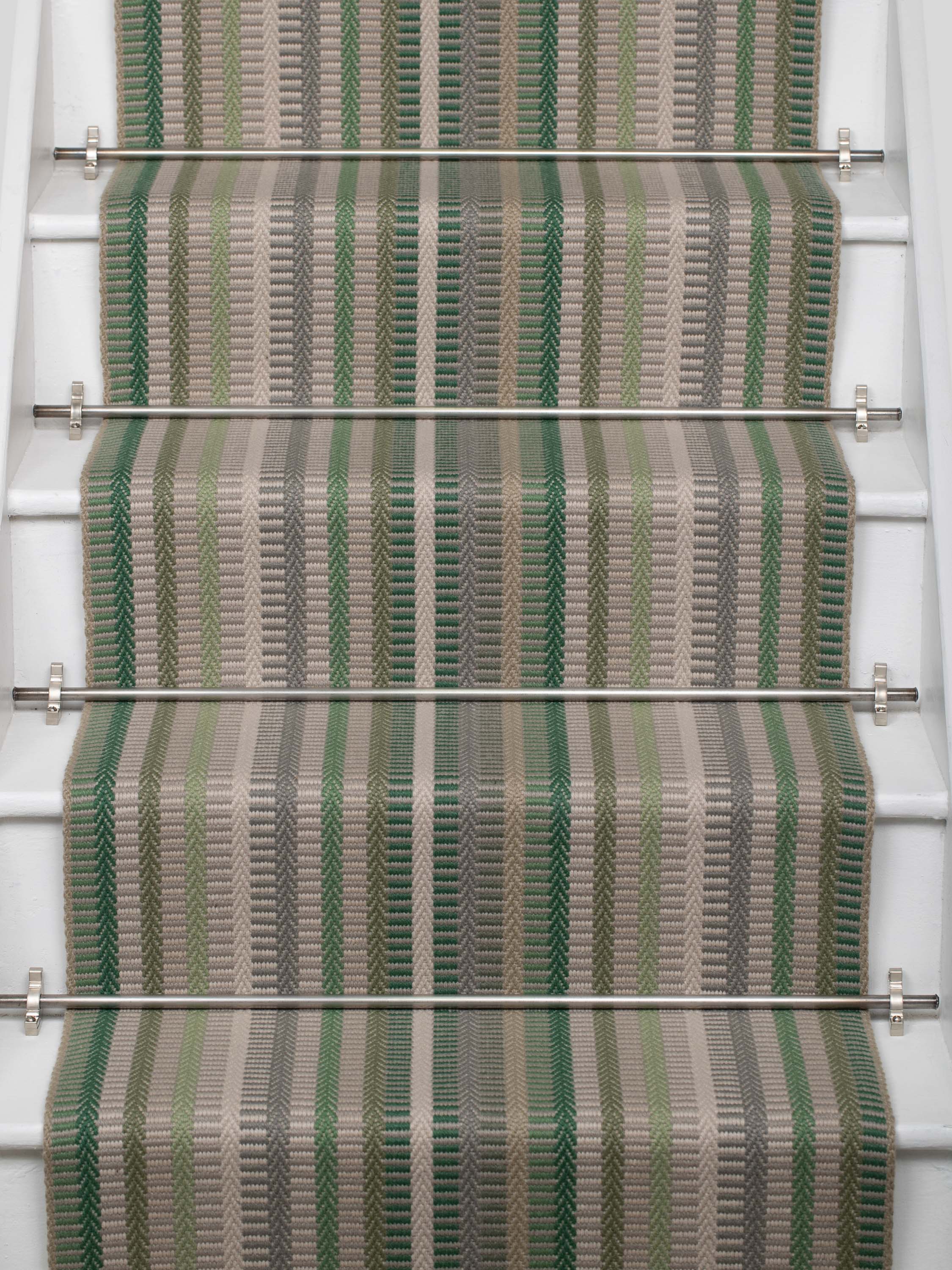 Striped flatweave runner in green and grey on white staircase