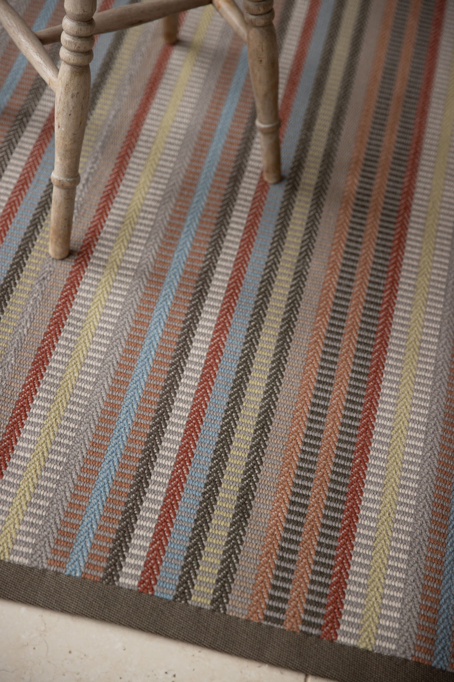 Striped flatweave runner in green and grey tan blue red and tan 