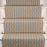 Striped with crosses flatweave runner in tan and blue on white staircase