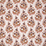 Patterned fabric with floral design in brown, pink and purple on a light background