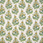 Pattern of green and yellow floral design on a white background
