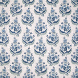 Patterned fabric with blue floral design on a white background
