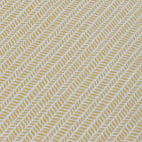 Detail of a wallpaper panel in a painterly herringbone print in yellow on a light blue field.