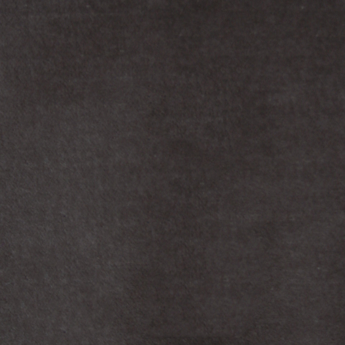 Detail of velvet fabric yardage in dark gray.