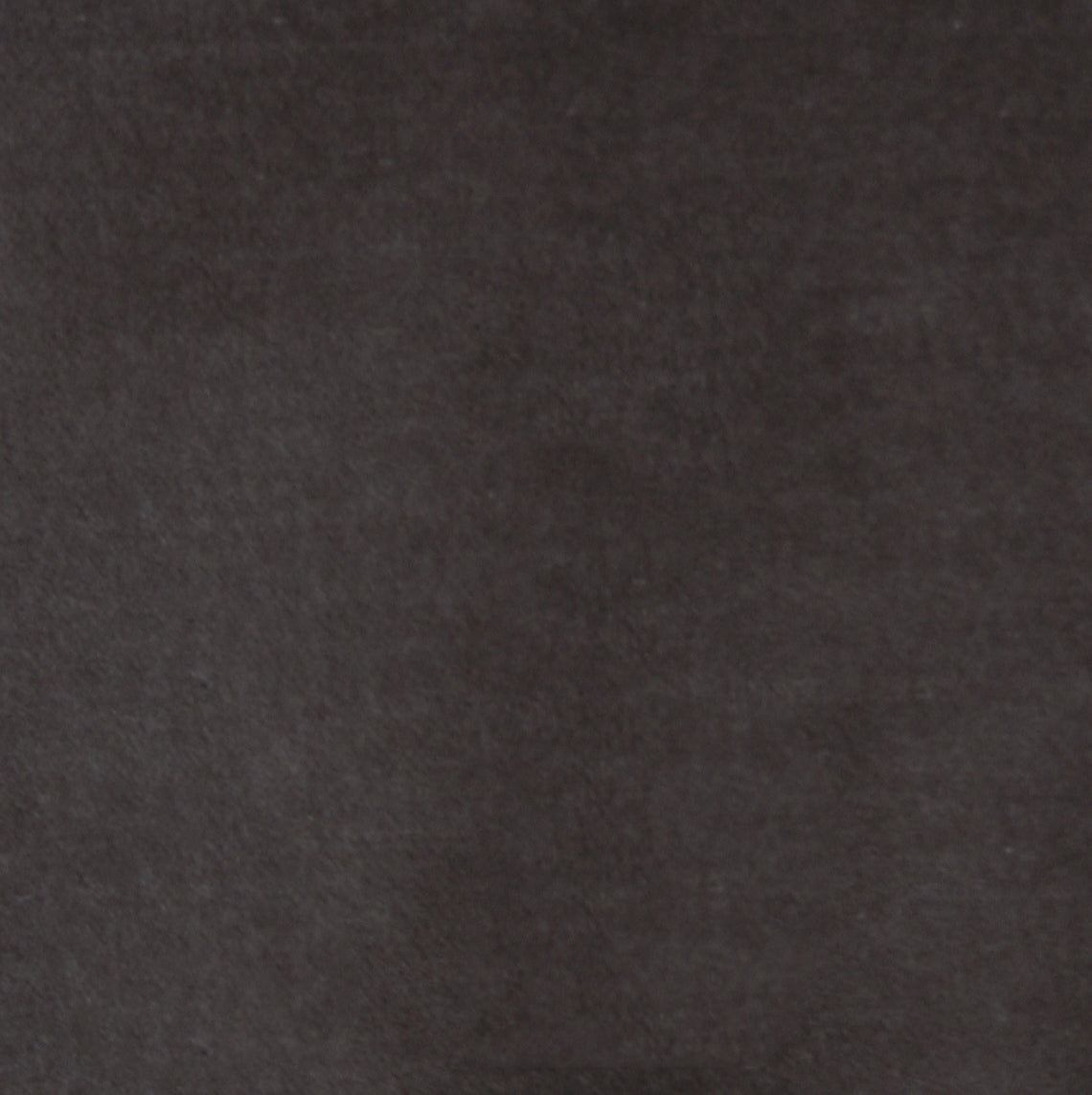 Detail of velvet fabric yardage in dark gray.