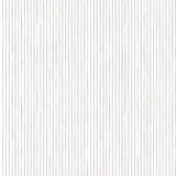 Detail of fabric in a painterly stripe pattern in light gray on a white field.