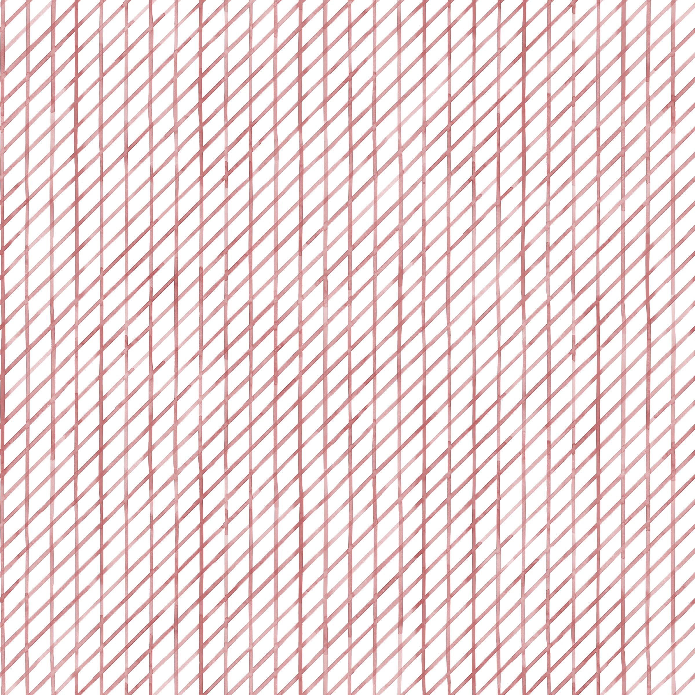 Detail of fabric in a painterly uneven grid pattern in rose on a white field.