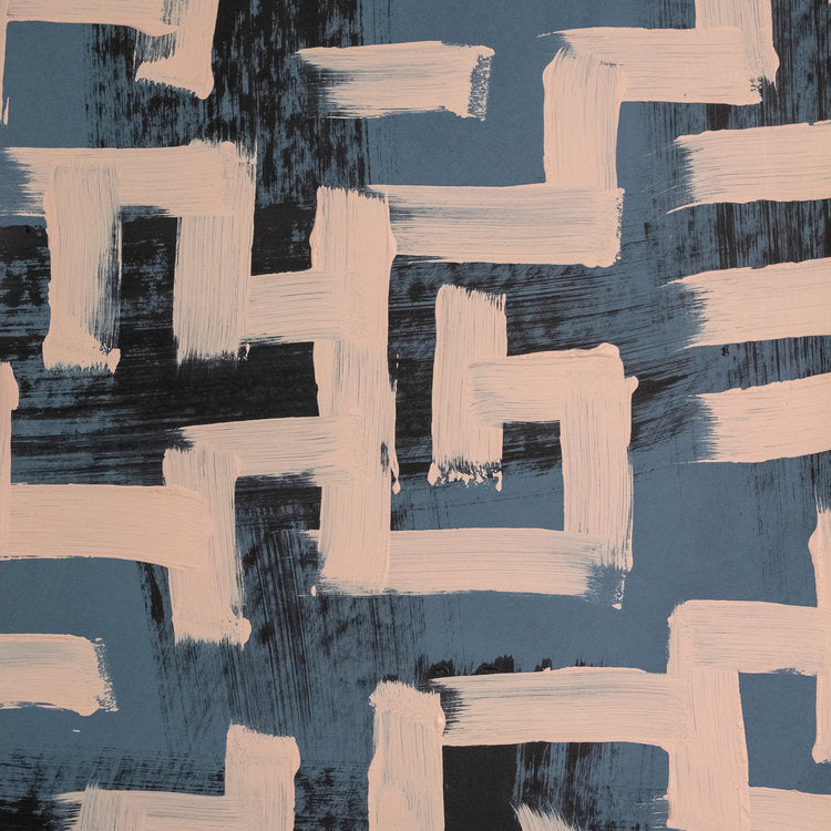 Detail of wallpaper in an abstract paint print in shades of pink, navy and black.