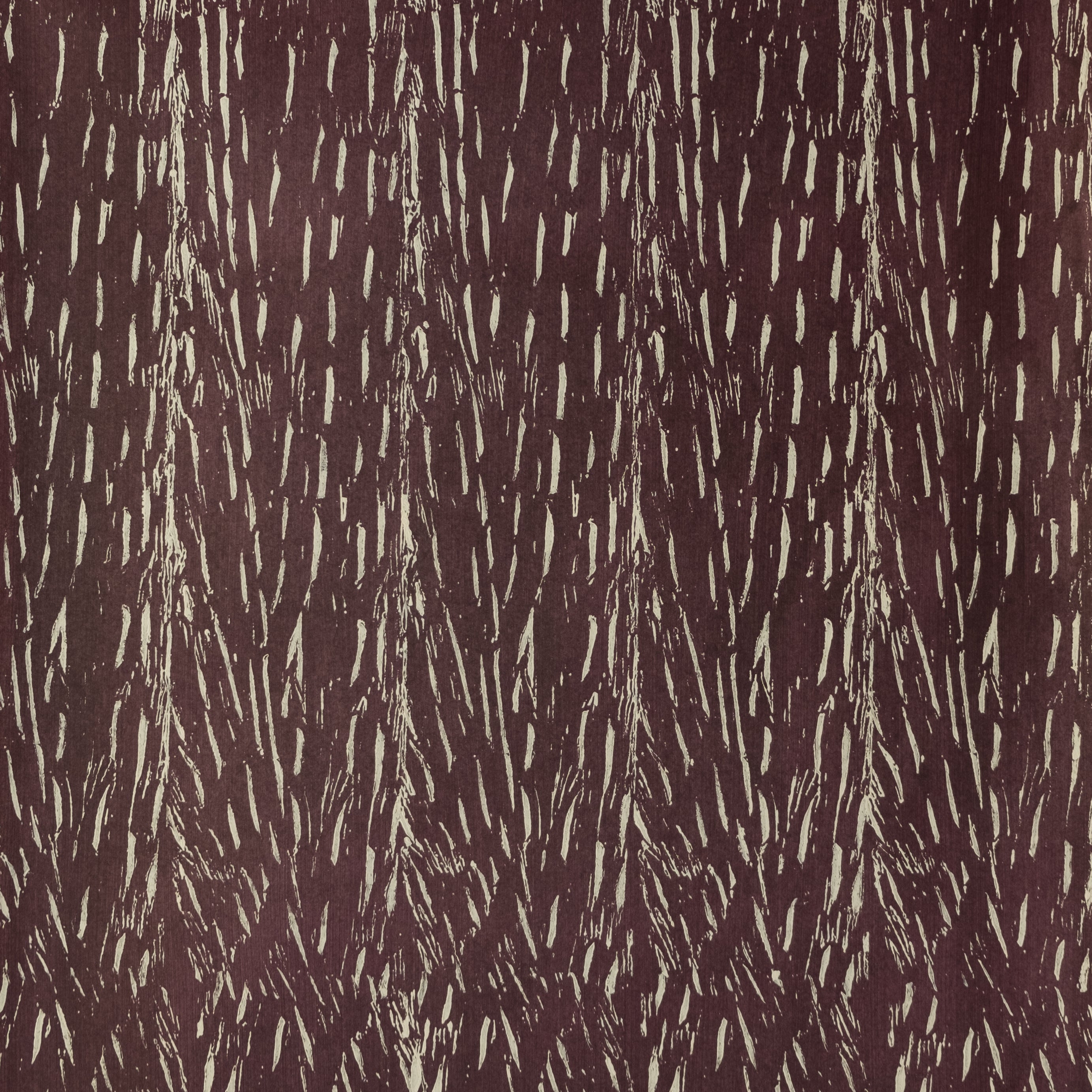 Detail of wallpaper in an abstract textural print in brown on a tan field.