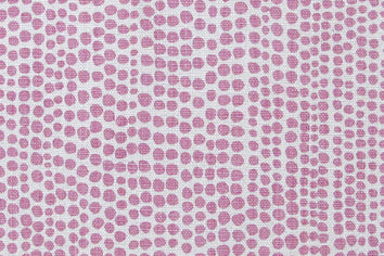 Detail of wallpaper in a painterly dotted print in light purple on a white field.