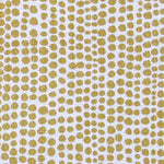 Detail of wallpaper in a painterly dotted print in mustard on a white field.