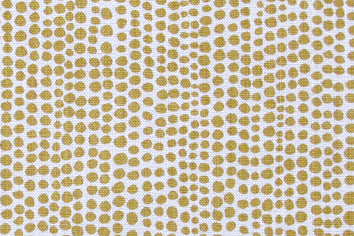 Detail of wallpaper in a painterly dotted print in mustard on a white field.