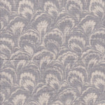 Detail of fabric in a marbled paint print in shades of gray and cream.