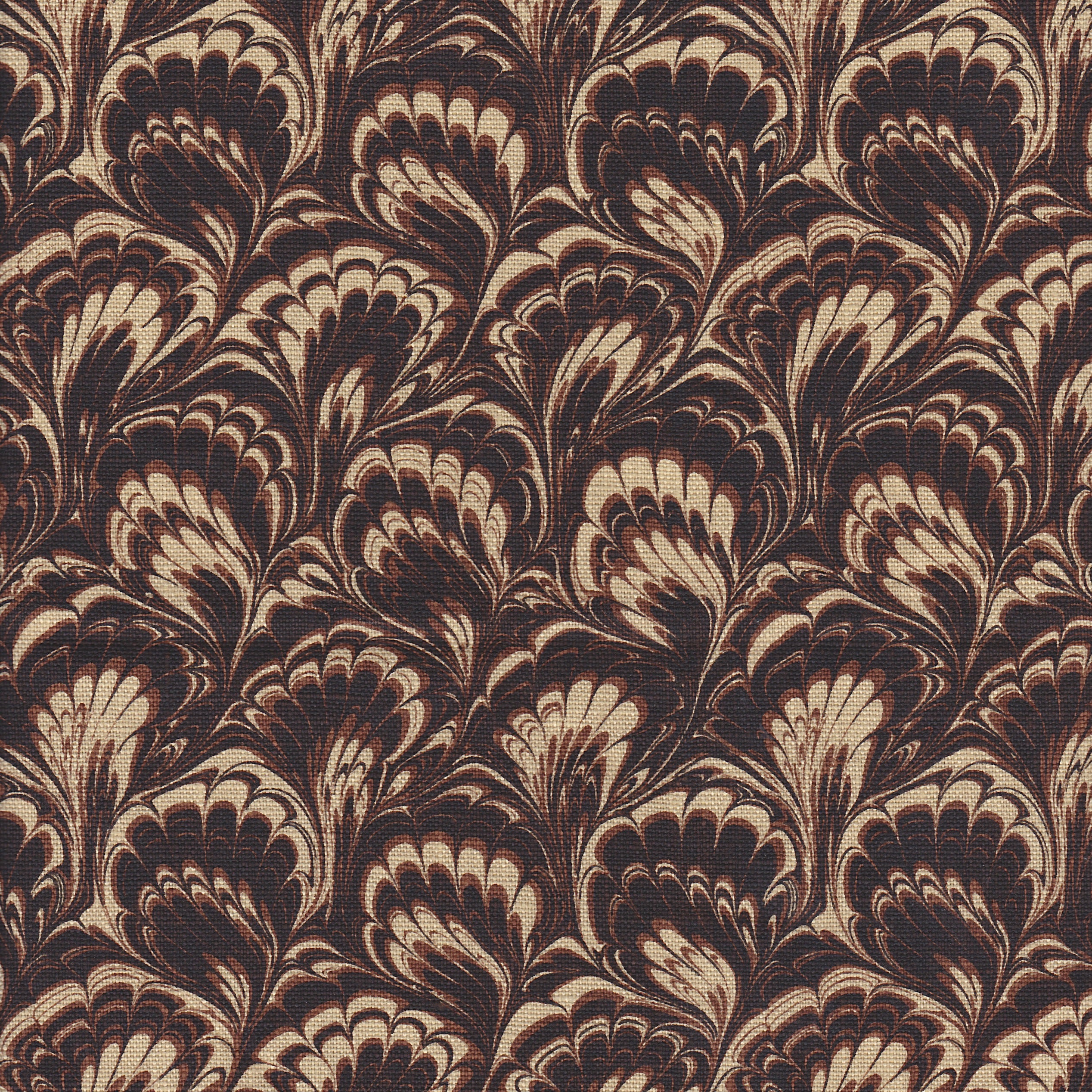 Detail of fabric in a marbled paint print in shades of brown and tan.