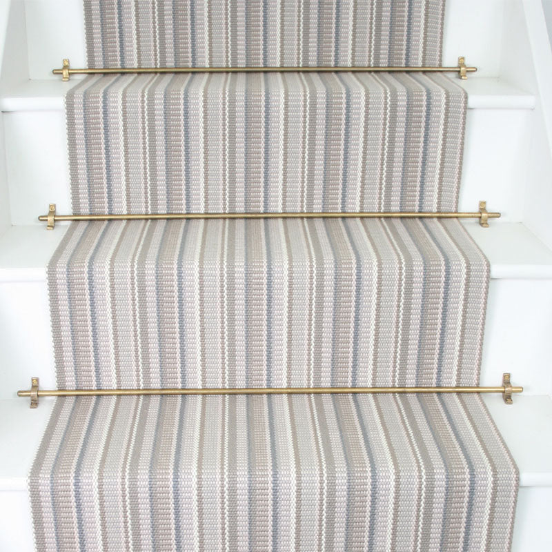 Striped flatweave runner in grey taupe cream on white staircase