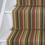 Striped flatweave runner in red tan sage brown on white staircase