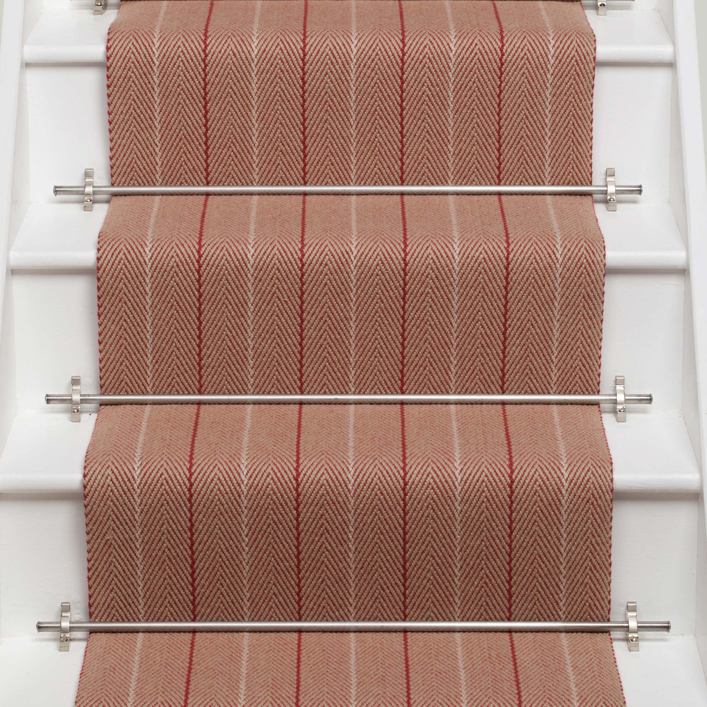 Striped flatweave runner in red and sand on white staircase