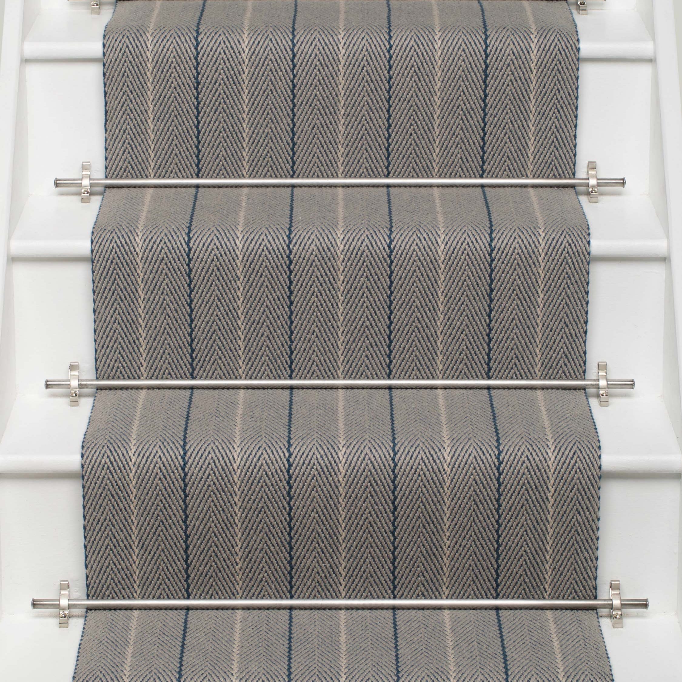 Striped flatweave runner in grey and blue on white staircase