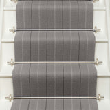 Striped flatweave runner in grey on white staircase