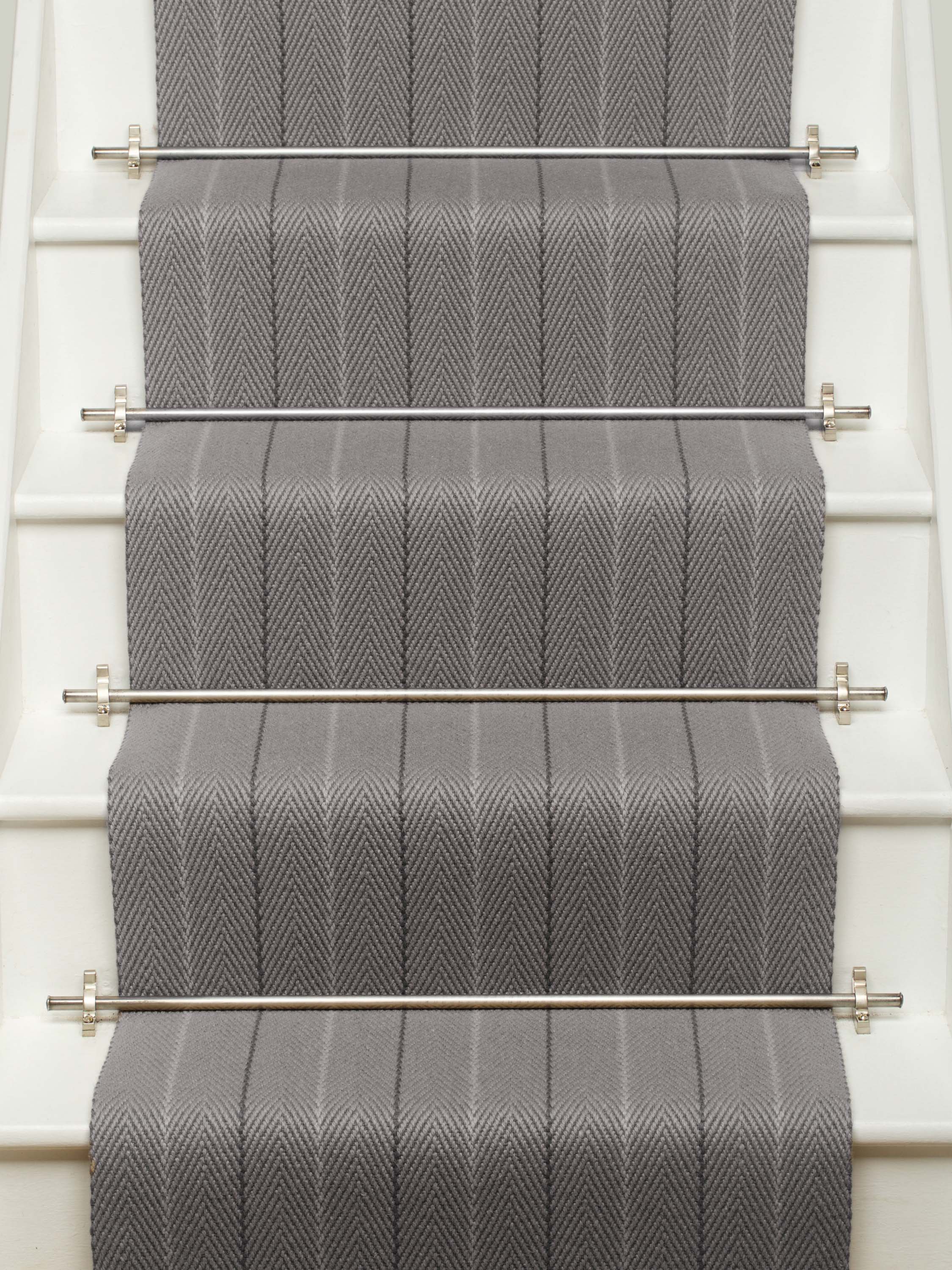 Striped flatweave runner in grey on white staircase