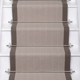 Striped flatweave runner in grey and dark grey on white staircase