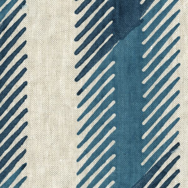 Fabric in a playful broken stripe pattern in mottled navy on a cream field.