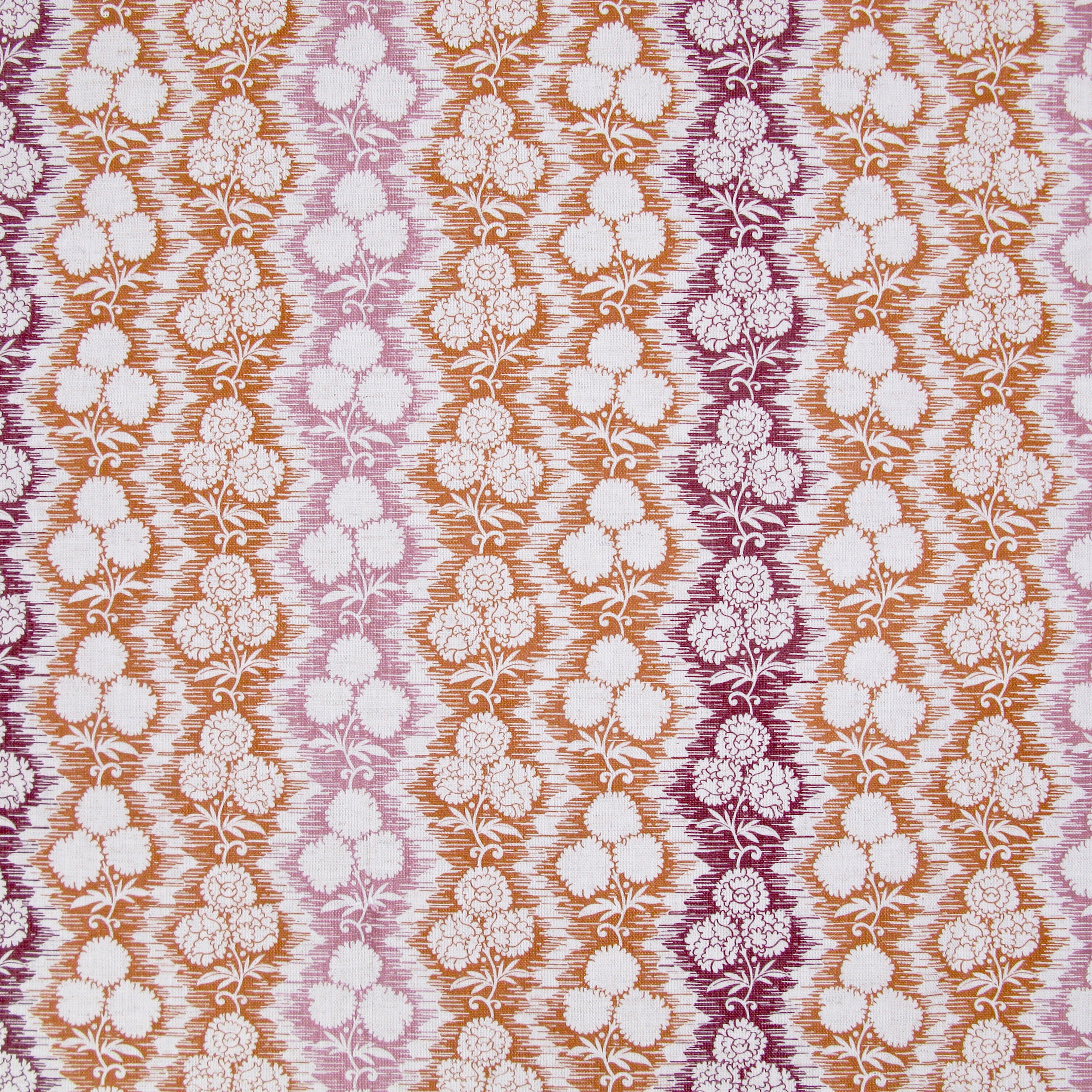Fabric in a detailed botanical stripe print in shades of pink, purple and orange on a white field.