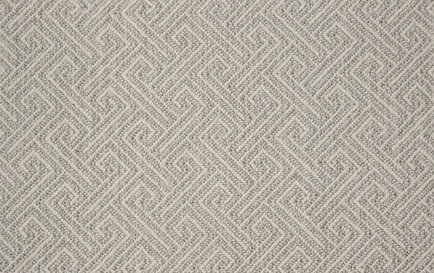 Broadloom carpet swatch in wavy geometric pattern light grey color