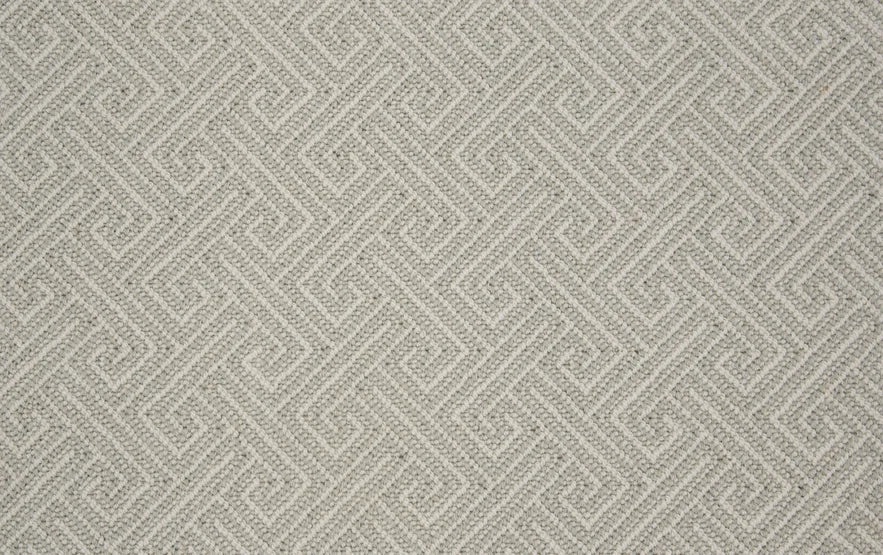 Broadloom carpet swatch in wavy geometric pattern light grey color