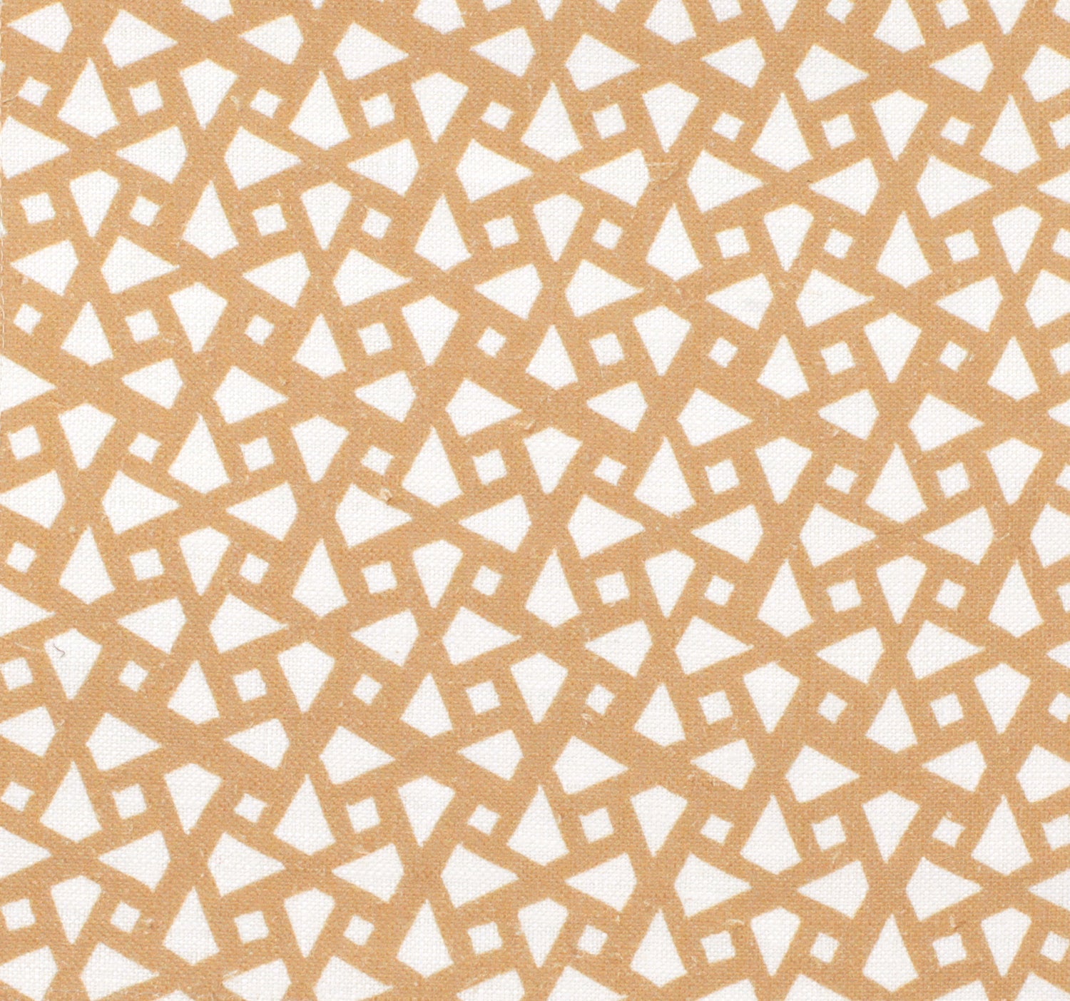 Detail of fabric in a geometric lattice print in gold on a white field.