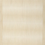 Handwoven rug in a geometric design in shades of beige. 