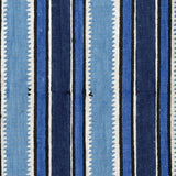 Fabric in a playful irregular stripe pattern in shades of blue, navy and cream.