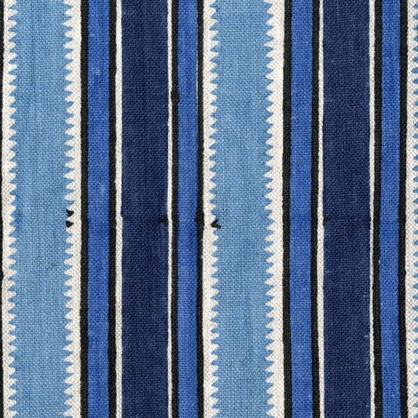 Fabric in a playful irregular stripe pattern in shades of blue, navy and cream.