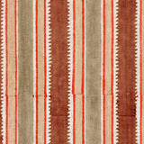 Fabric in a playful irregular stripe pattern in shades of brown, yellow and red.
